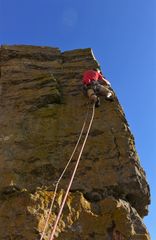 Nick Taylor on the FA of "English Ghosts" on Holys Wash Buttress, Gower, South Wales