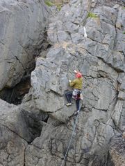 Gwyn evans on the first ascent of "Flying Arête", Blackhole Crag, Gower, South Wales