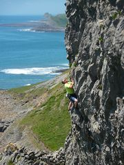 Goi Ashmore climbing at First Sister, Gower, South Wales